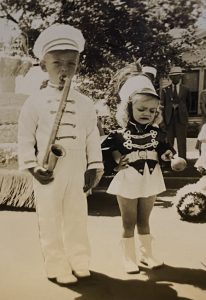 Four-year old Roy Hunt with friend, Mary Frances Gill, at Strawberry Festival.
