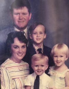 Leah Watkins with her family when she was in kindergarten.