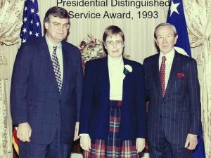 Mary Kilgour with Warren Christopher, former Secretary of State and Brian Atwood, former Administrator of USAID.