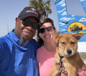 Tracey Henderson with her husband, Paris, and dog, Meatball.