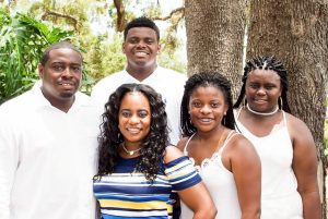 Albert Fuller with family (from left to right:, front row: Albert Fuller, Jr., Ty Fuller, Jamiya Fuller and Alexia Fuller; back row Albert Fuller, III)