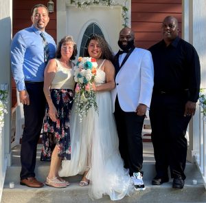Jonathan Mann with his family at his sister's wedding. (left to right: Jonathan, Valeri Williams, Amber Mann, brother-in-law, Jokeel Graham, and Charles Mann.