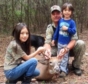 Mike Dudley, hunting with daughter, Rebecca age eight and son, Michael, age five.