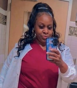 Monesia Reese taking a selfie in her uniform.