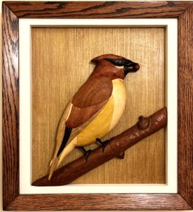 Keith Berg's cedar waxwing made using intarsia wood art.