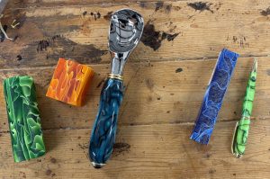 Kent Cori uses blocks of acrylic to make ice cream scoops and pens.