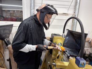 Kent Cori working on his acrylic handle for an ice cream scoop.