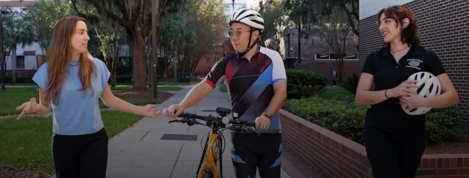 Hongwu Wang, Ph.D. professor in the UF College of Public Health and Health Professions with his students.